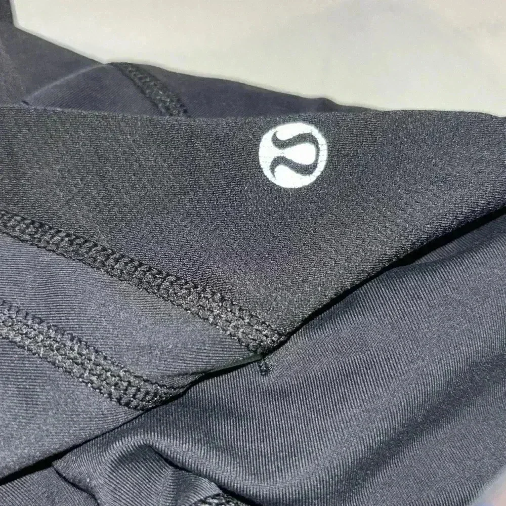 (#13)NWOTLululemonWomen'sSize4Run Inspire Crop II Black Petal Pop Multi Leggings - Picture 6 of 6